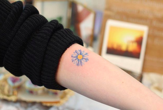 daisy wrist tattoo