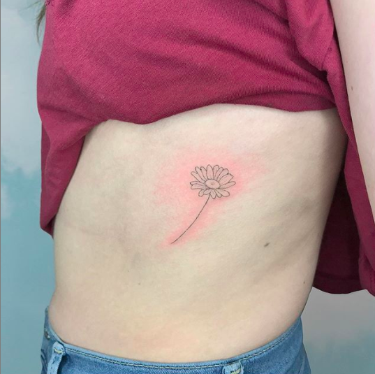 Updated pictures of the daisy tattoo for the people that were asking to see  it after the stencil finally came off of my skin! :) original post is  linked on the 1st