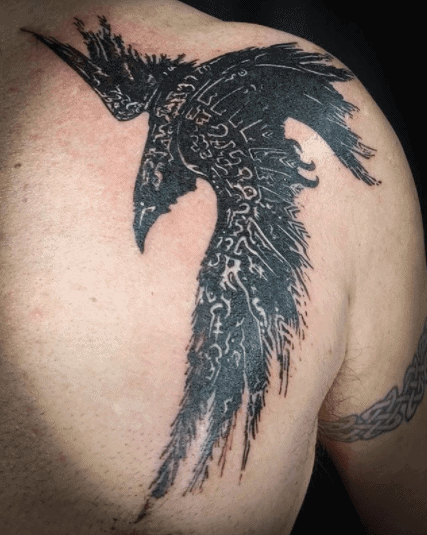 Black Ink Flying Raven Chest Tattoo