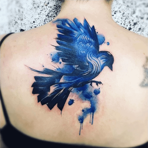 First Tattoo Raven holding the Deathly Hallow  Cory John Heisson Caged Raven  Tattoo Worcester MA  rtattoos