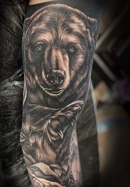 Richard hit each and every detail on this grizzly bear with landscape  forearm wrap before lockdown 💯 we hope to be able to tattoo you all again  very soon 🤞🏻 | By