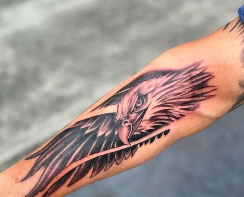 Forearm eagle tattoo by @killerinktattoos