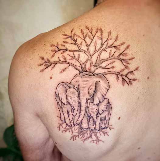 Elephant On Tree Tattoo Design