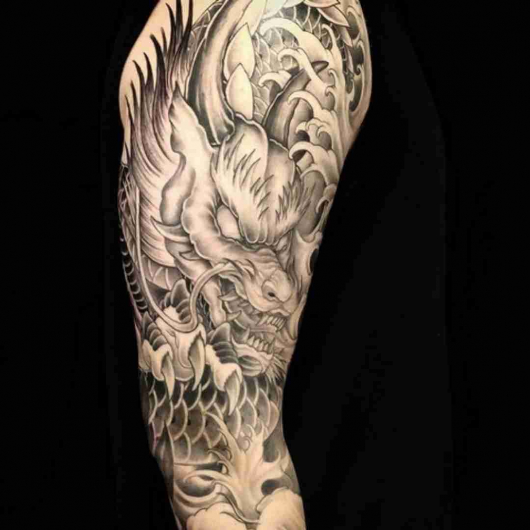 Dragon sleeve done by Gabriele Cardosi at Cloak & Dagger London : r/tattoos