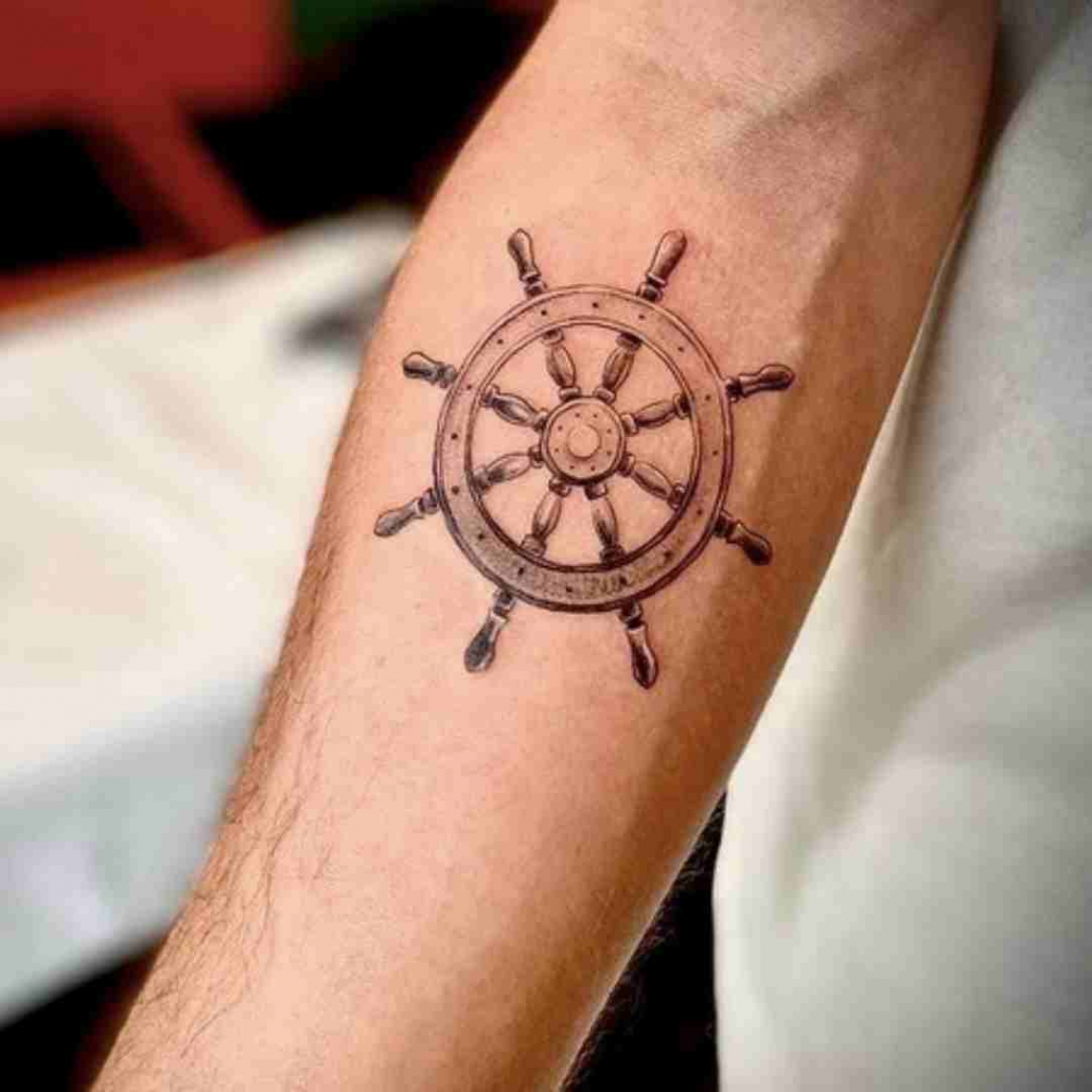 Traditional Ship Wheel With Anchor Tattoo On Man Neck
