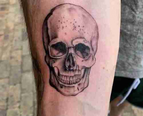 Realistic skull tattoo by @seth_tattooo