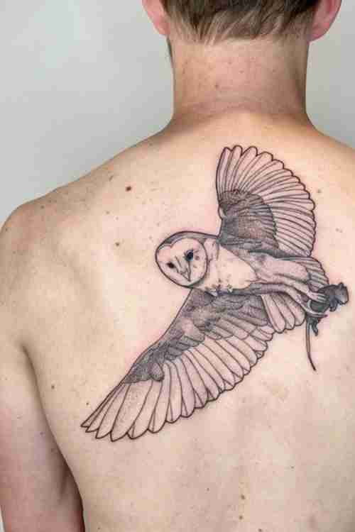 complex hyperrealistic owl tattoo wings spreaded cover up for a large  tribal back tattoo